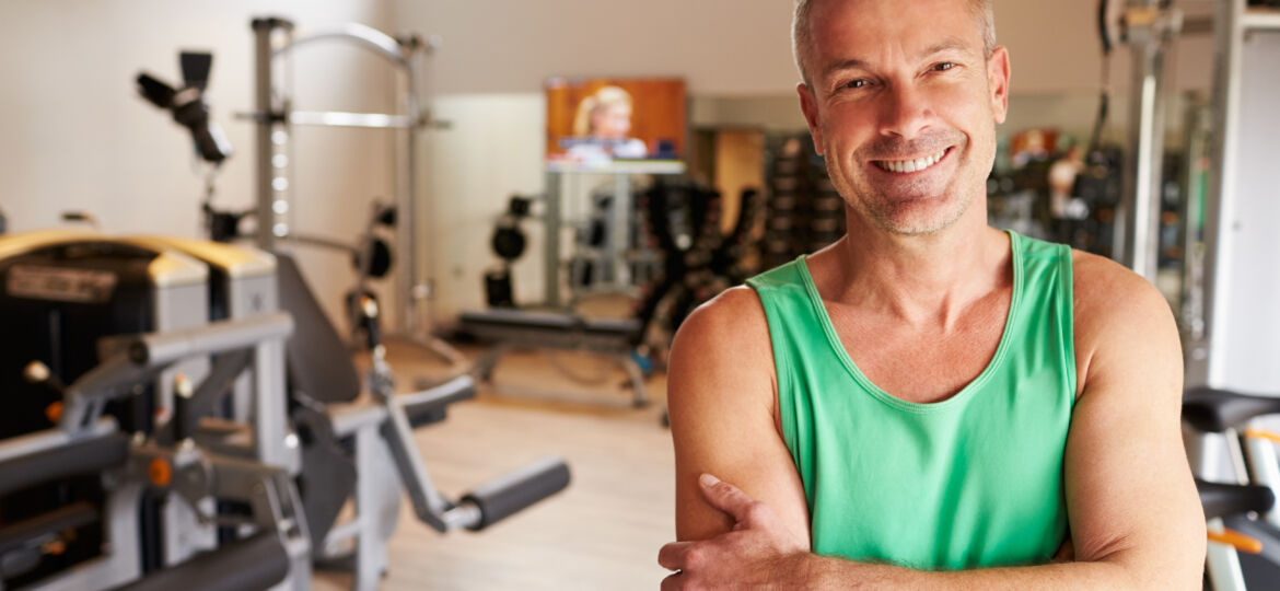 Portrait Of Mature Man Standing In Gym